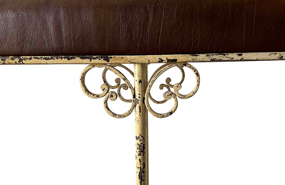 Large, late 19th century English fire fender with decorative wrought ironwork. Seat upholstered in leather. AD & PS Antiques