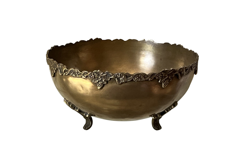 Large round champagne bucket with pretty grape vine decoration to the rim. It sits on four raised ornate feet - French Antiques