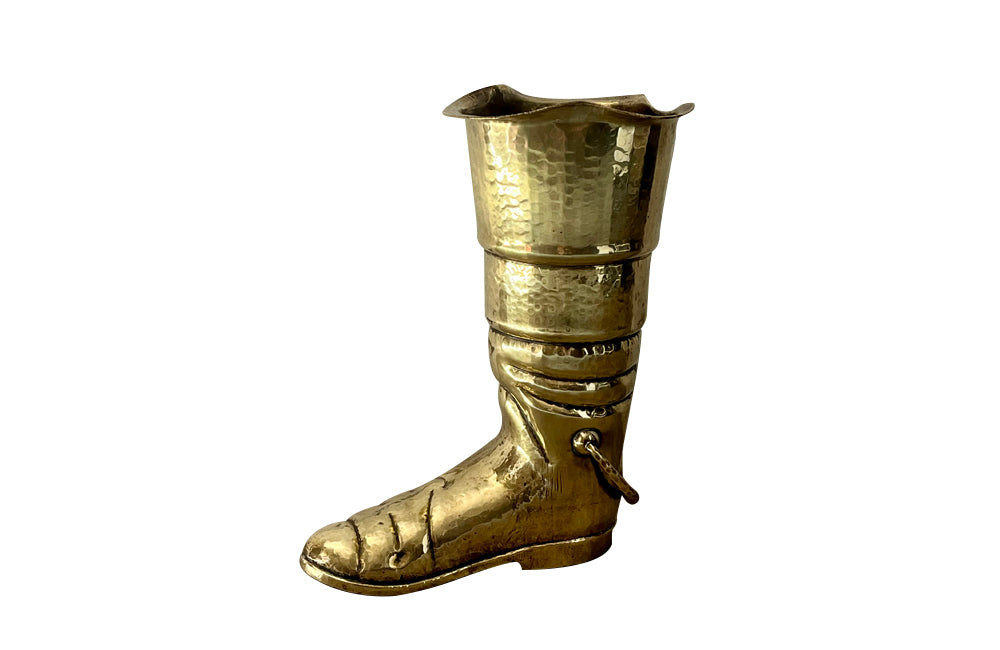 Mid century decorative umbrella stand in the form of a large brass riding boot