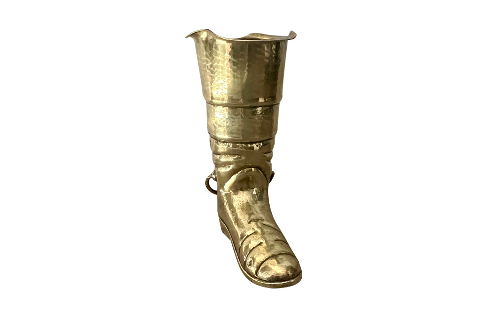 Mid century decorative umbrella stand in the form of a large brass riding boot