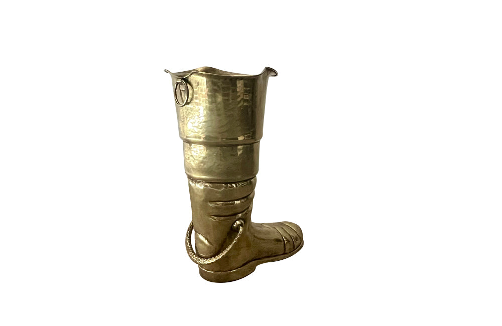 Mid century decorative umbrella stand in the form of a large brass riding boot