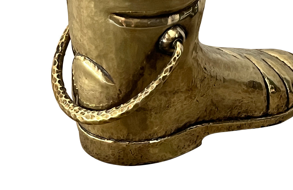 Mid century decorative umbrella stand in the form of a large brass riding boot