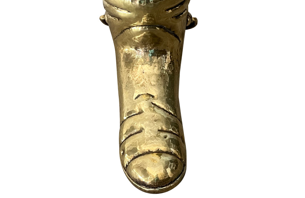 Mid century decorative umbrella stand in the form of a large brass riding boot