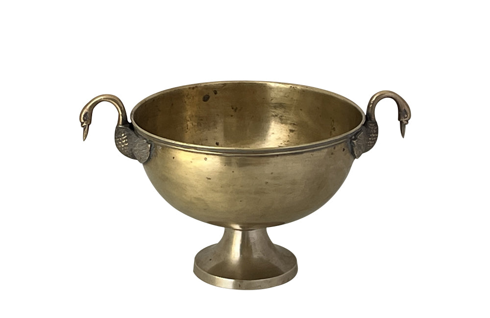 20th Century elegant wine or champagne cooler with open winged swan handles.