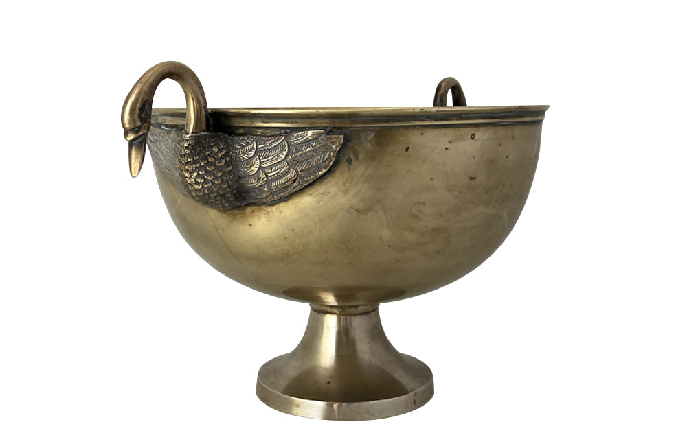 20th Century elegant wine or champagne cooler with open winged swan handles.