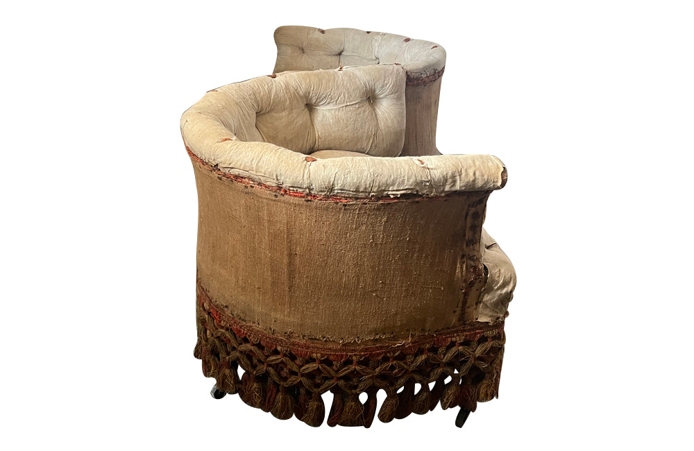 Antique love seat - 19th century, Napoleon III two seat canape tripped back to its old under fabric with original tassel skirt  