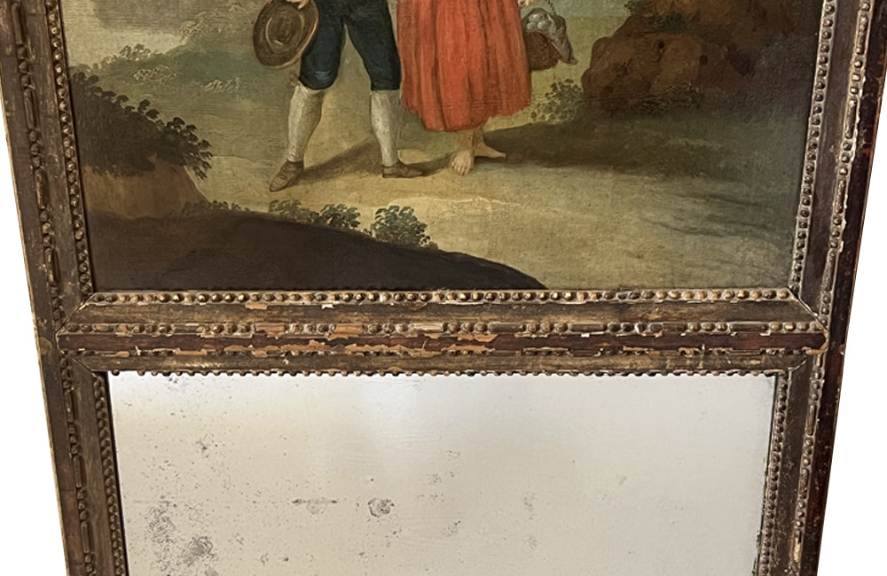 early 19th Century French giltwood trumeau mirror with original oil on canvas painting
