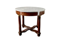 mahogany Empire centre table with Carrara marble top and stylised cross-stretcher.