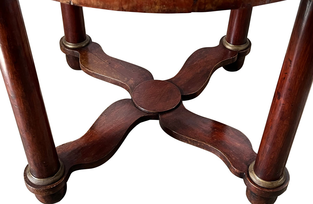 mahogany Empire centre table with Carrara marble top and stylised cross-stretcher.