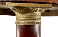 mahogany Empire centre table with Carrara marble top and stylised cross-stretcher.