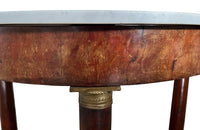 mahogany Empire centre table with Carrara marble top and stylised cross-stretcher.