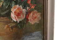 Signed 20th Century French framed still life oil on wood painting of roses in a confit pot.