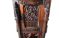 Antique credenza or hall cupboard in walnut in the Neo-Gothic style. French. Signed A. Bastet, Lyon. French antique furniture