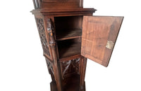 Antique credenza or hall cupboard in walnut in the Neo-Gothic style. French. Signed A. Bastet, Lyon. French antique furniture