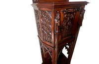 Antique credenza or hall cupboard in walnut in the Neo-Gothic style. French. Signed A. Bastet, Lyon. French antique furniture