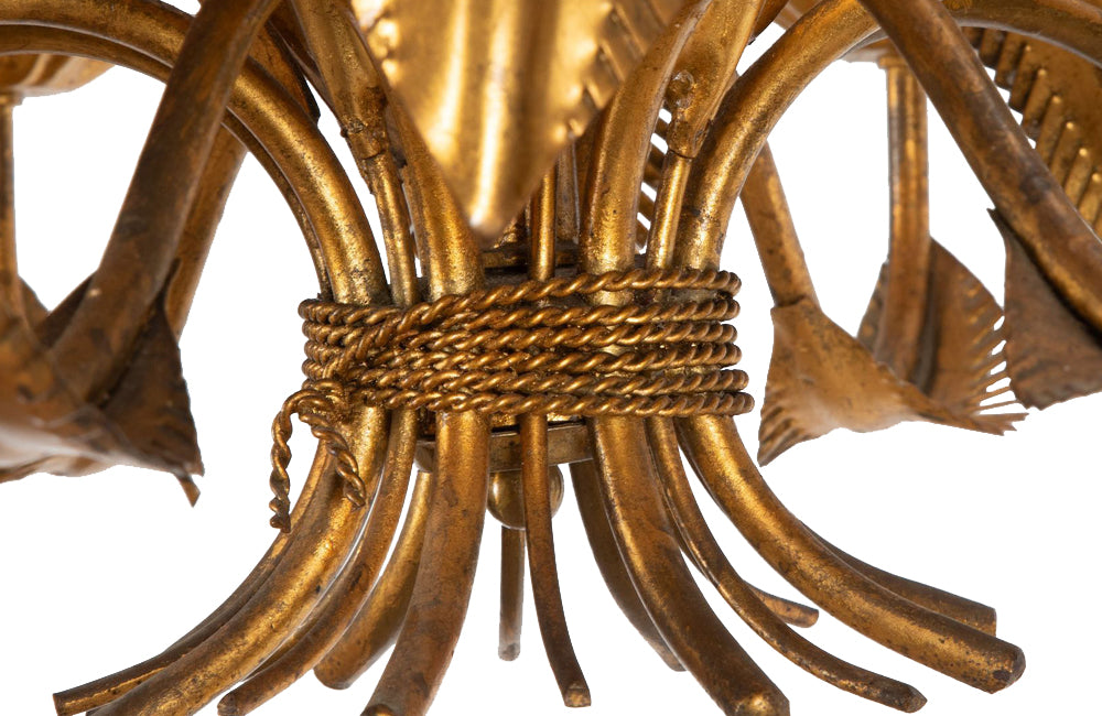 Large mid 20th century gilt metal chandelier with palm fronds surrounding a central ringed stem in the manner of Maison Jansen - Mid Century Lighting
