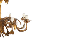 Large mid 20th century gilt metal chandelier with palm fronds surrounding a central ringed stem in the manner of Maison Jansen - Mid Century Lighting