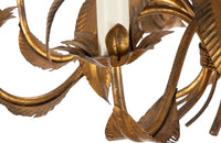 Large mid 20th century gilt metal chandelier with palm fronds surrounding a central ringed stem in the manner of Maison Jansen - Mid Century Lighting