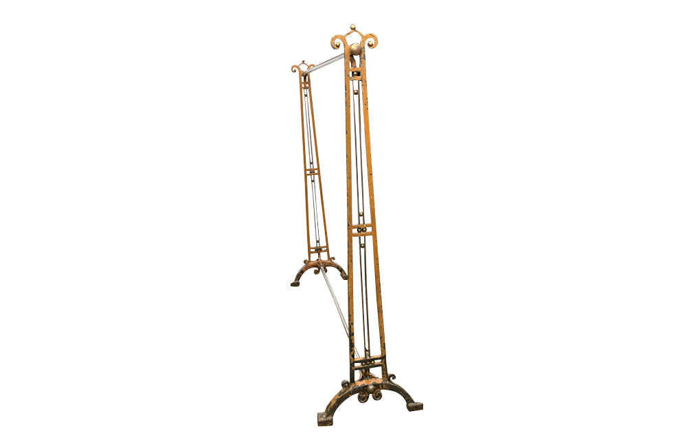 Fabulous, early Art Deco large iron clothes rail with decorative brass bars, ball and knobs, two chrome rails and ttributed to the renown designer Josef Hoffmann.