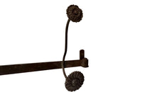 Long French iron coat & hat rack with 4 double flower hooks.