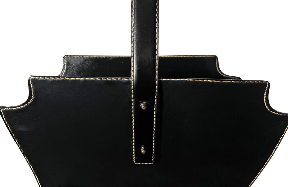 20th century stitched black leather with brass studs magazine holder by Jacques Adnet.