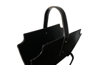 20th century stitched black leather with brass studs magazine holder by Jacques Adnet.