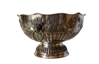 Early 20th Century English nicely worn silverplate footed punch bowl or champagne cooler with lion head ring handles and gadroon rim.