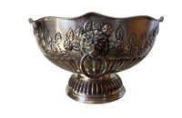 Early 20th Century English nicely worn silverplate footed punch bowl or champagne cooler with lion head ring handles and gadroon rim.