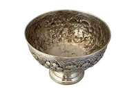 20th Century French large silverplate champagne bucket with repousse grape vine decoration.