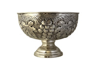 20th Century French large silverplate champagne bucket with repousse grape vine decoration.