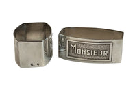 Very smart pair of silver plate napkin rings with Madame & Monsieur Art Deco lettering in rectangular cartouches.