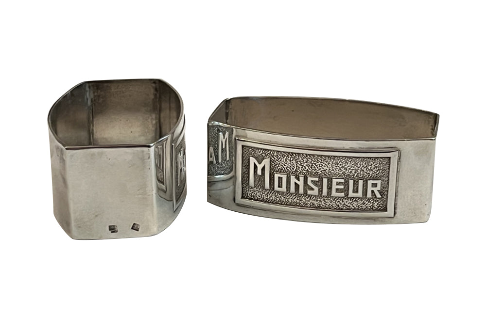 Very smart pair of silver plate napkin rings with Madame & Monsieur Art Deco lettering in rectangular cartouches.