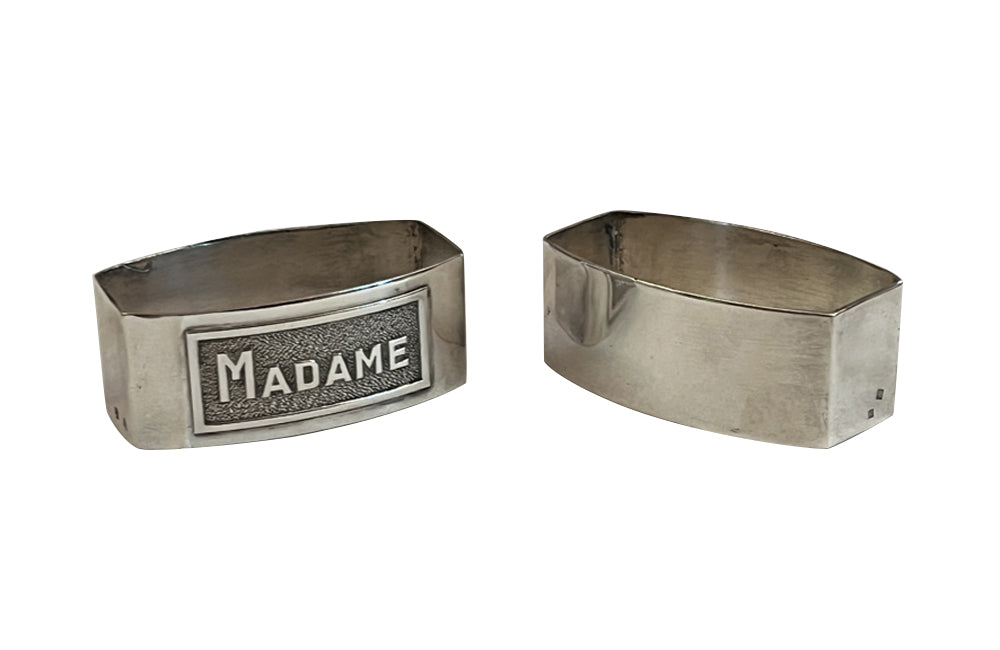 Very smart pair of silver plate napkin rings with Madame & Monsieur Art Deco lettering in rectangular cartouches.