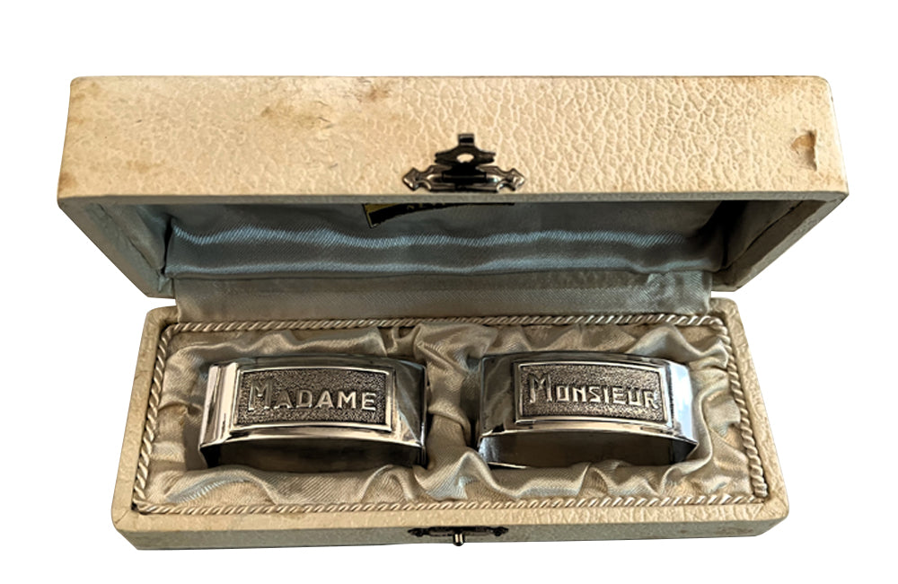 Very smart pair of silver plate napkin rings with Madame & Monsieur Art Deco lettering in rectangular cartouches.