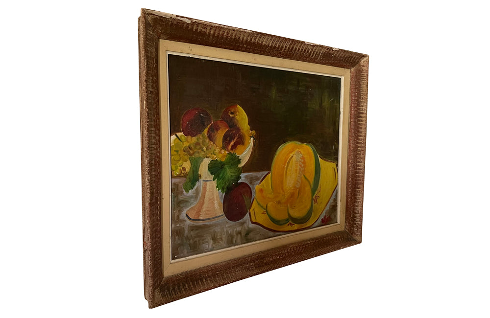 Modernist still life painting of a cut open melon on yellow dish with peaches and grapes on a creamware compote