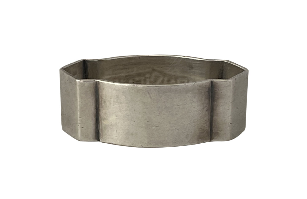 20th Century French silverplate napkin ring engraved 'Monsieur' with stylised garland above and below.