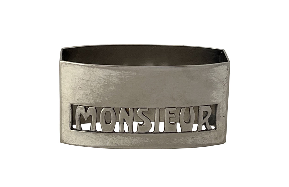 20th Century French silverplate napkin ring with cut-out 'Monsieur' lettering