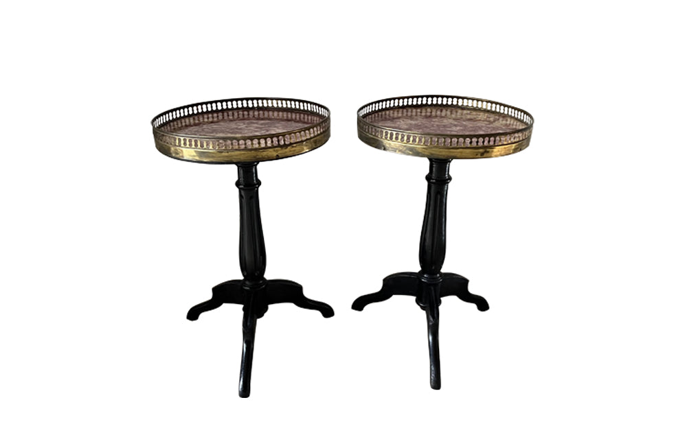 Pair of 19th century ebonised round cocktail tables with Pyrenean Brocatelle marble top and brass pierced galleries.