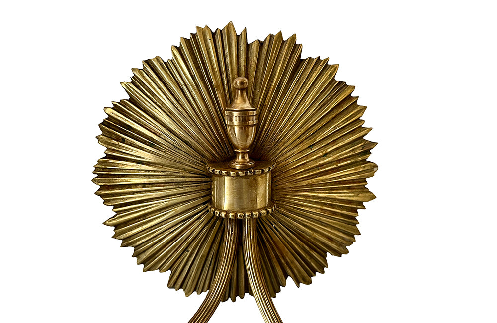 ison Charles bronze sunburst wall sconces.