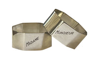 Very stylish pair of octgonal silver plate napkin rings with engraved Madame & Monsieur block letter lettering.