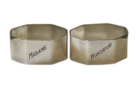 Very stylish pair of octgonal silver plate napkin rings with engraved Madame & Monsieur block letter lettering.