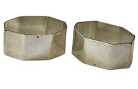 Very stylish pair of octgonal silver plate napkin rings with engraved Madame & Monsieur block letter lettering.