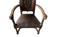 Pair of tall French oak ornately carved armchairs in the Neo-Gothique style.