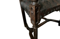 Pair of tall French oak ornately carved armchairs in the Neo-Gothique style.