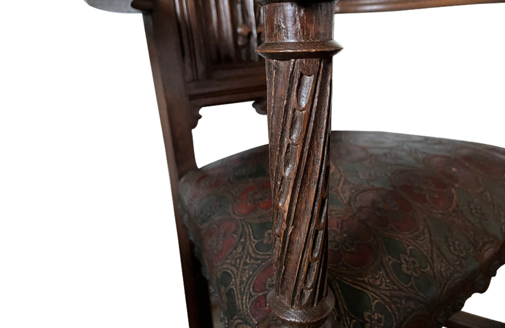 Pair of tall French oak ornately carved armchairs in the Neo-Gothique style.