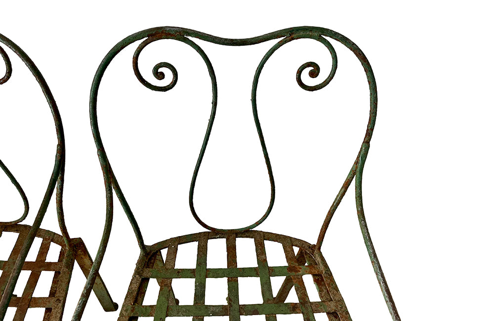 quirky pair of iron garden chairs