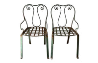quirky pair of iron garden chairs  circa 1900