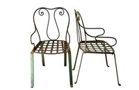 quirky pair of iron garden chairs  circa 1900