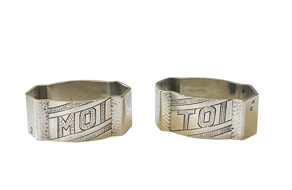 Pair of stylish, hammered, silver plate, Me and You, napkin holders from the Art Deco period.