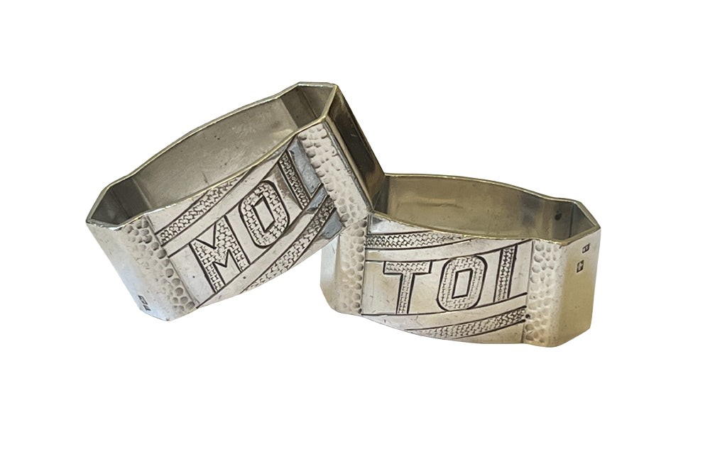 Pair of stylish, hammered, silver plate, Me and You, napkin holders from the Art Deco period.